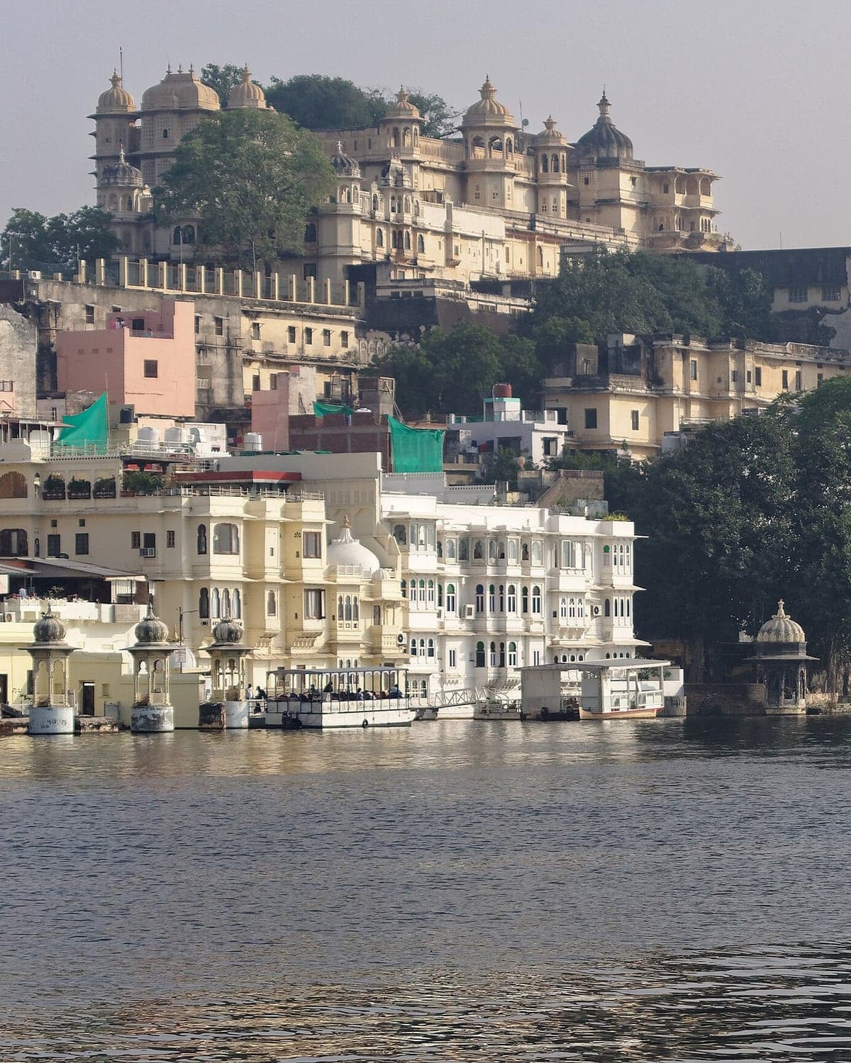 The City Palace rising above the ghats of Lake Pichola