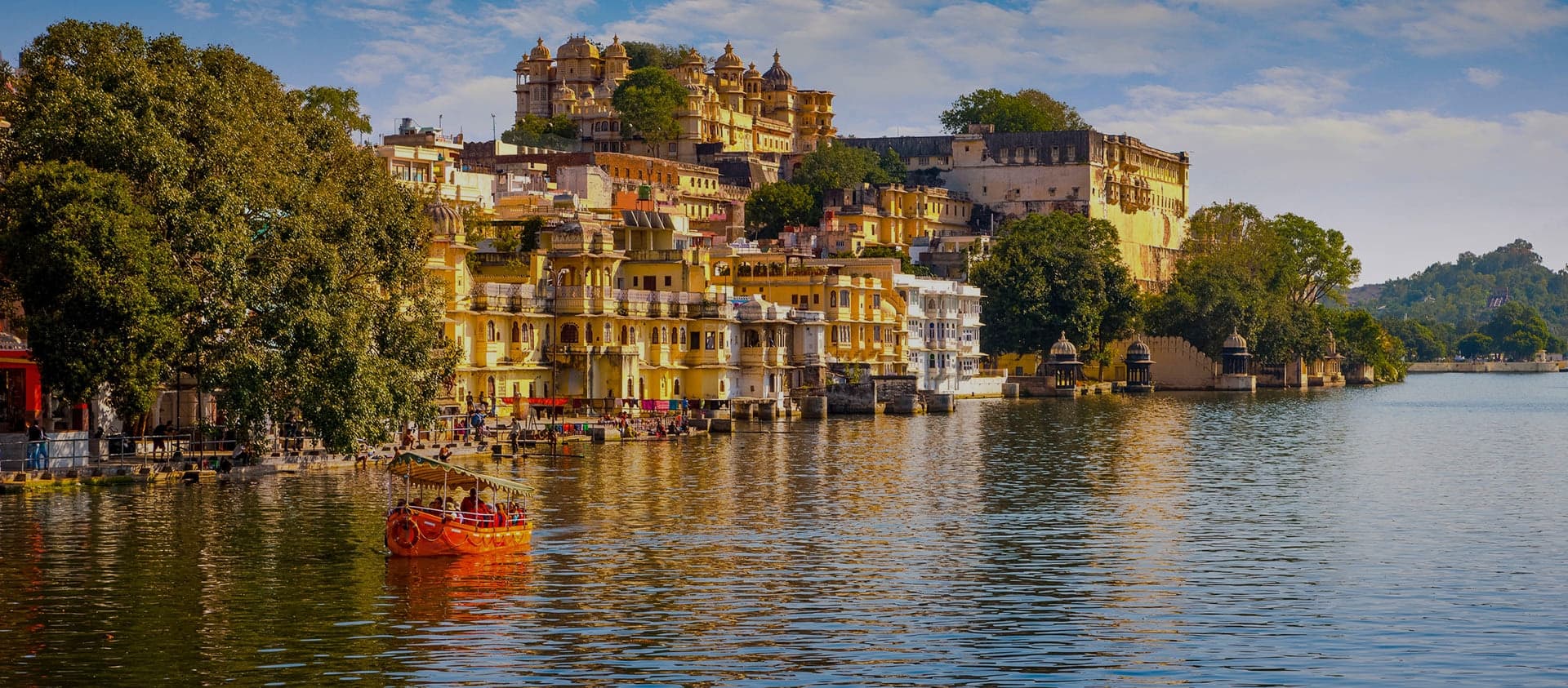 Udaipur’s lakeside palaces and ghats reflected in Lake Pichola