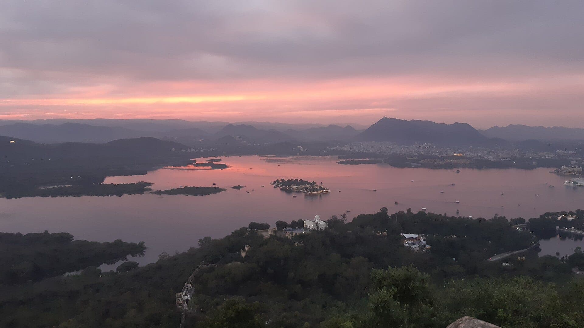 Sunset over Lake Pichola and Udaipur, seen from the ridge of Machla Magra hill